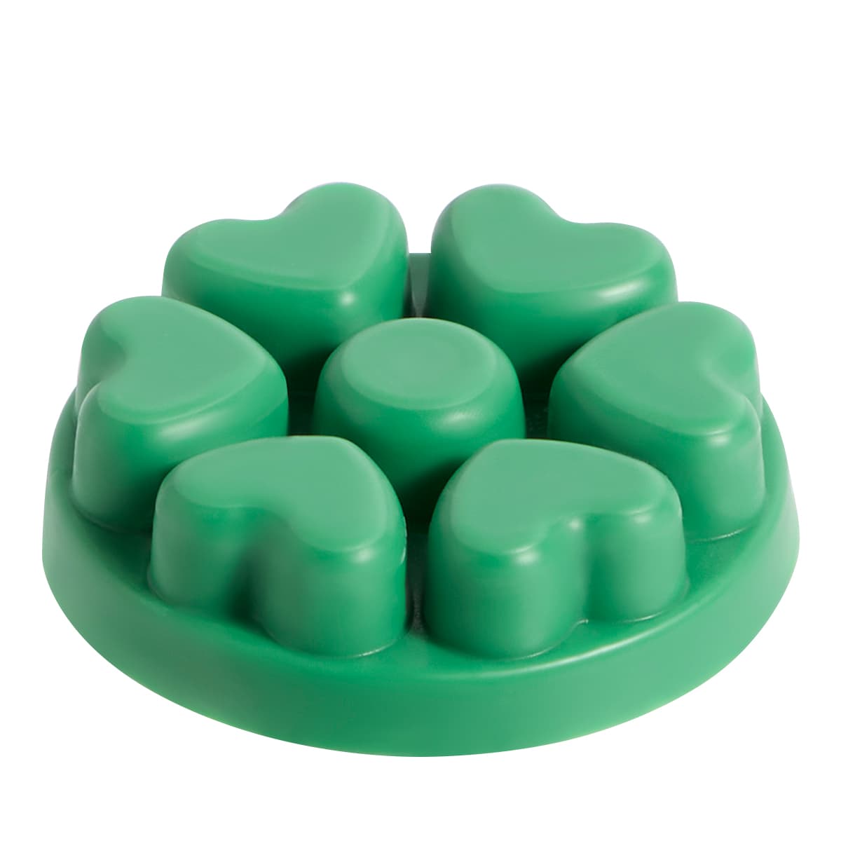Evergreen Fir heart shaped wax melts against a white background.