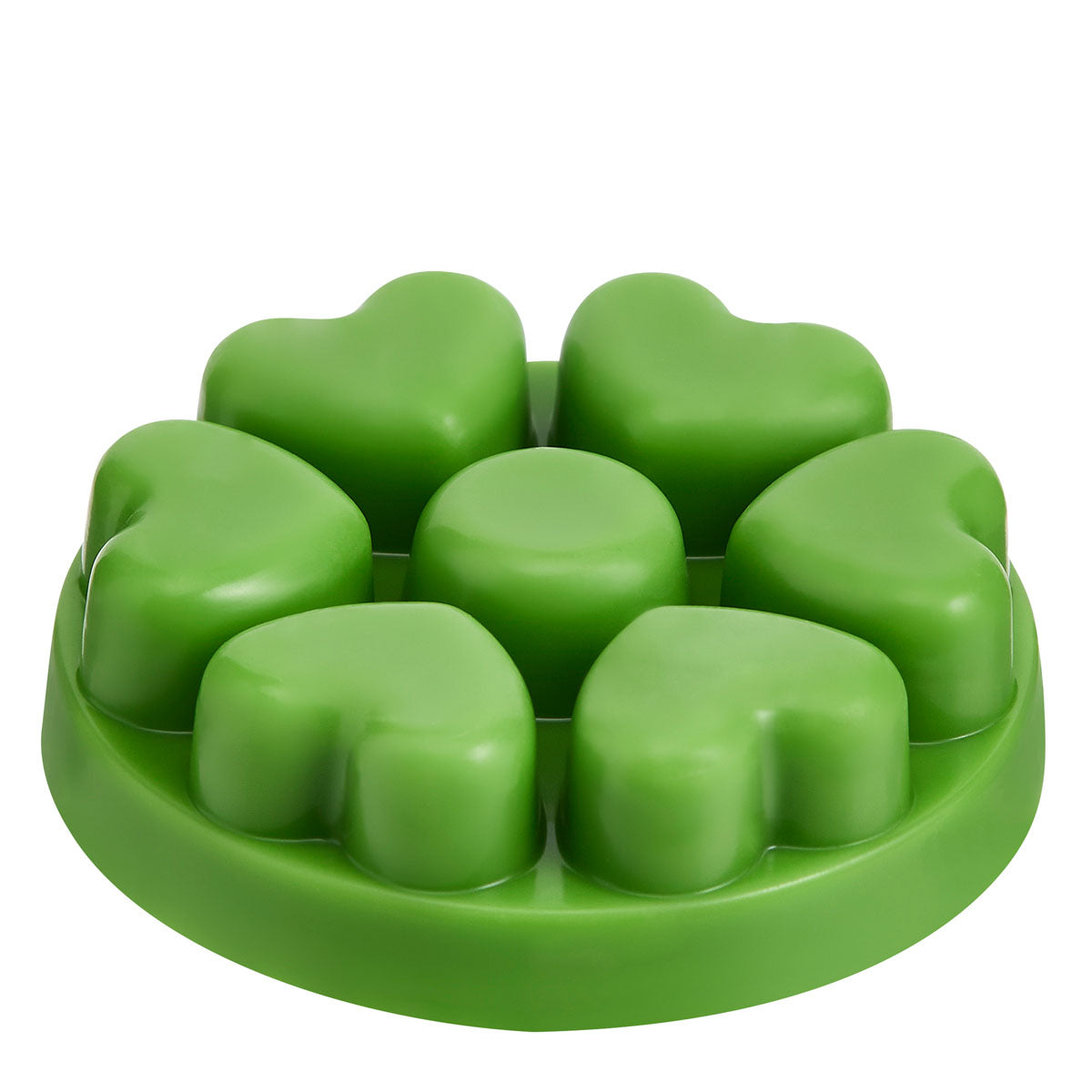 Sunlit Greenhouse heart shaped wax melts against a white background.
