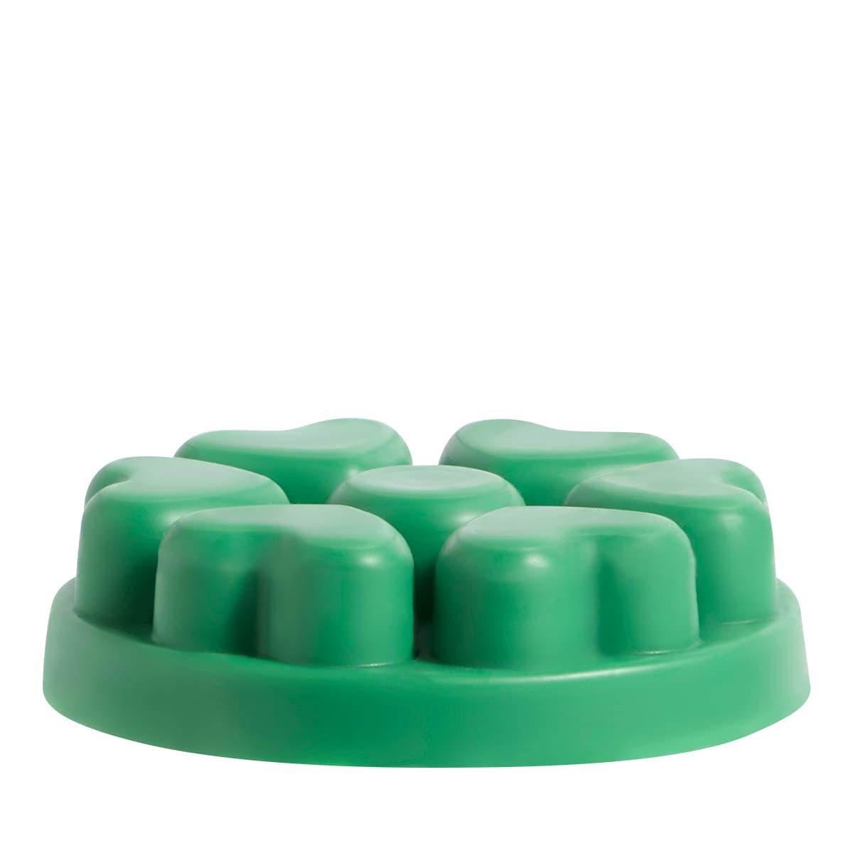 Evergreen Fir heart shaped wax melts against a white background.