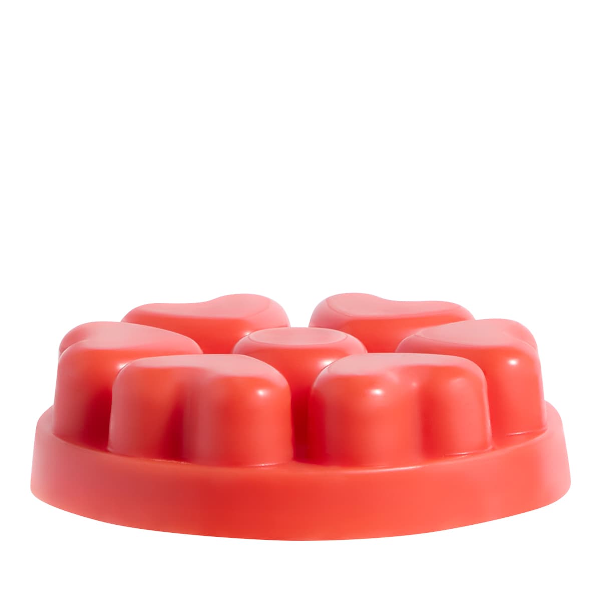 Berry & Bright heart shaped wax melts against a white background.