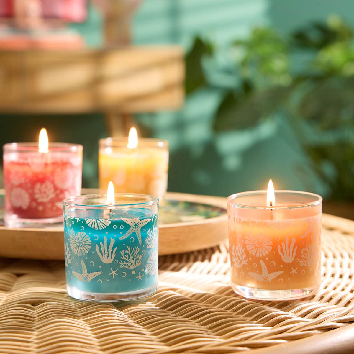 Assortment of colorful Mini Jars shown on a woven table top