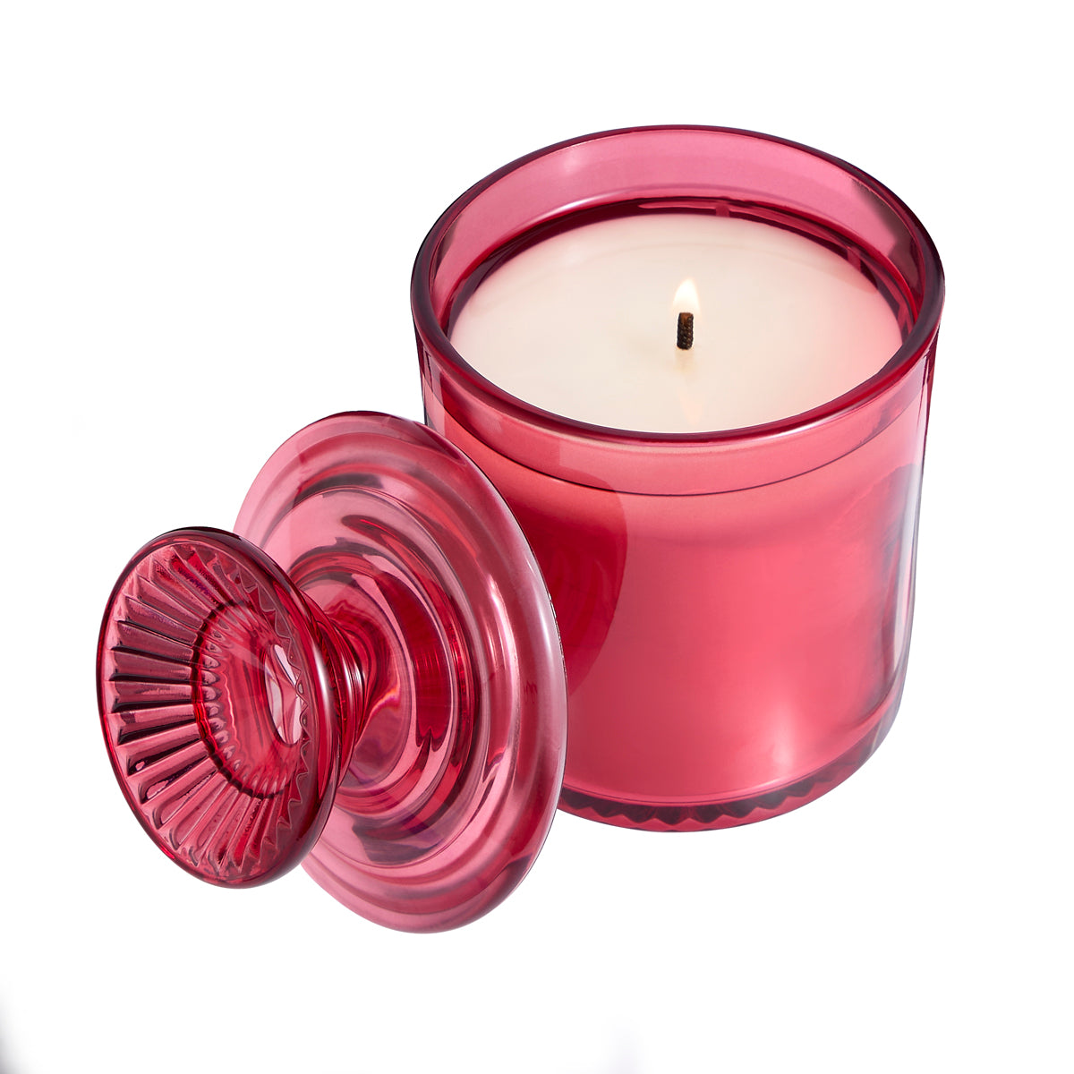 Garden Party Specialty Jar Candle shown lit with the lid of the jar standing next to the jar against a white background.