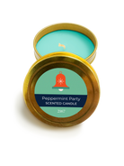 Peppermint Party scented candle in a gold tin with a green label on a white background