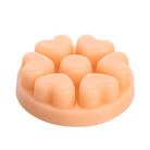 Light orange heart shaped melts on a white background