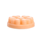 Light orange heart shaped melts with a white background.